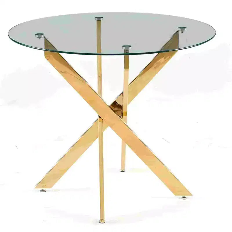 Elegante tavolo da pranzo dorato con ripiano in vetro e gambe incrociate