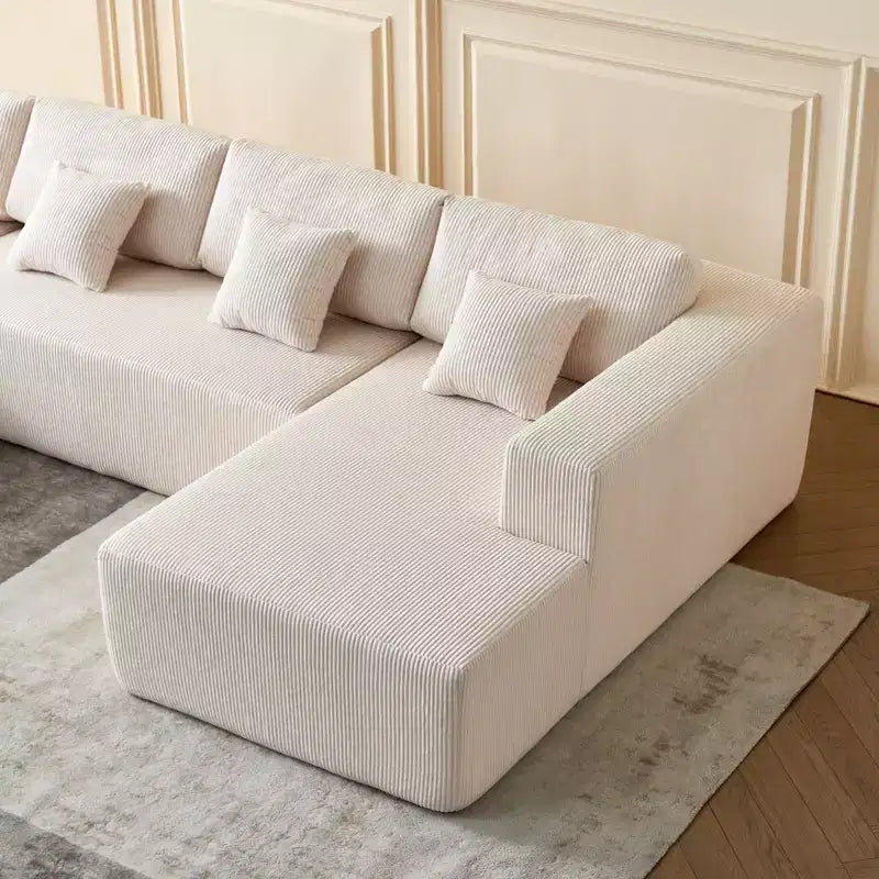 Divano componibile a U in velluto a coste, chaise longue reversibile e cuscini imbottiti, design moderno da 122 pollici