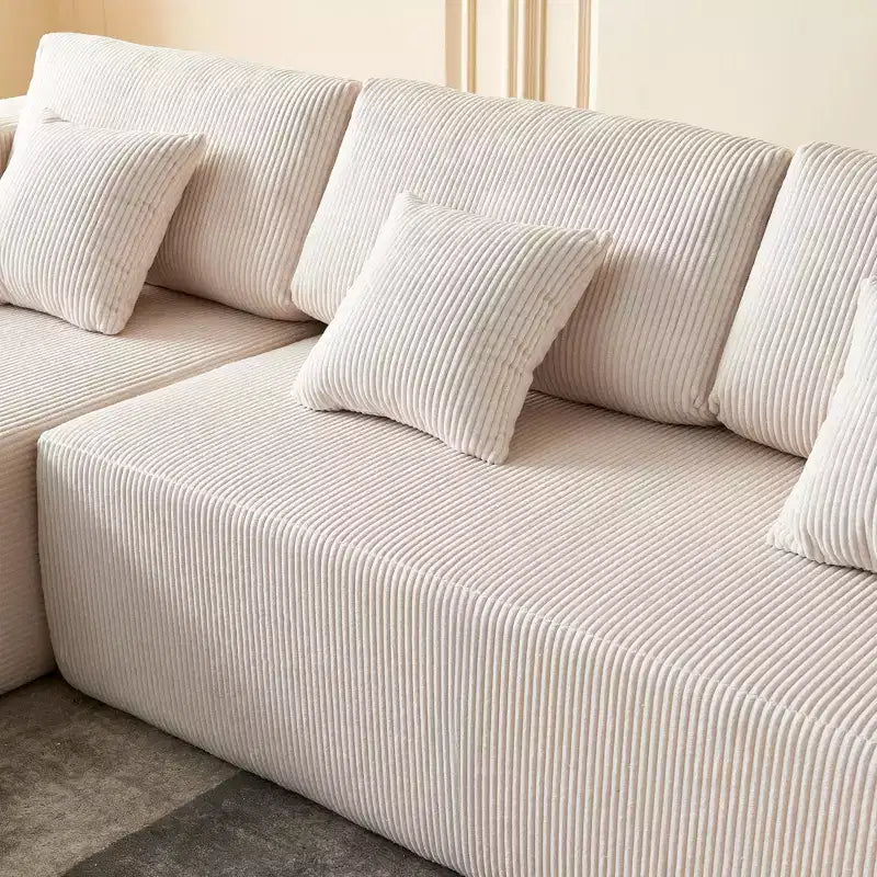 Divano componibile a U in velluto a coste, chaise longue reversibile e cuscini imbottiti, design moderno da 122 pollici