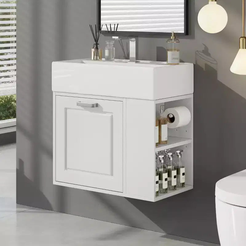 Mobile bagno sospeso da 55 cm con lavabo integrato, ampio cassetto, ripiani regolabili, portarotolo e sistema di chiusura ammortizzata