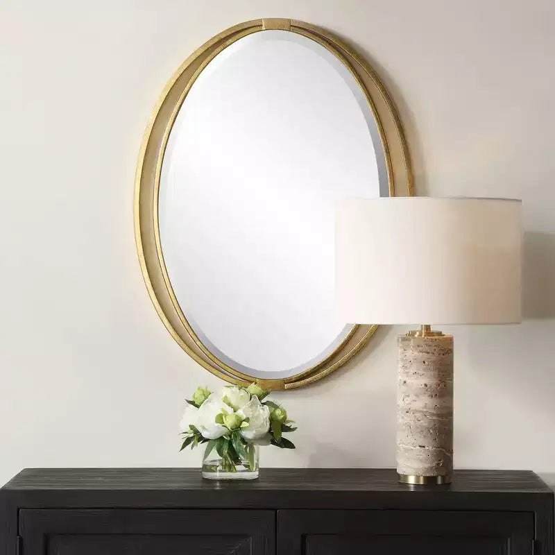 Specchio da parete ovale Uttermost Rhodes con foglia d'oro metallizzato 24 1/4 x 32