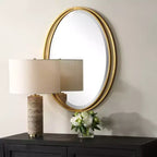 Specchio da parete ovale Uttermost Rhodes con foglia d'oro metallizzato 24 1/4 x 32