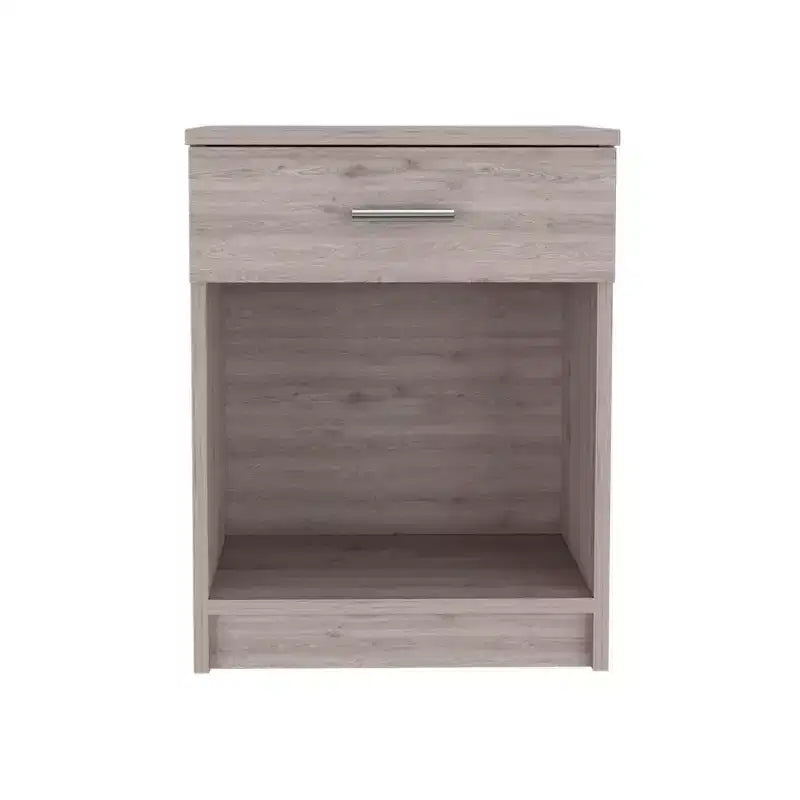 Con un design pulito e moderno, questo comodino 21H, con un cassetto, ripiano inferiore e ripiano superiore, di colore grigio chiaro, offre una soluzione pratica per riporre oggetti ed è robusto.