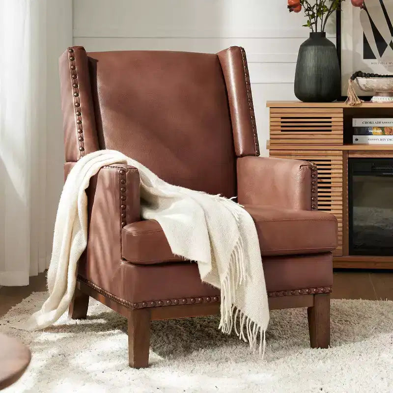 Poltrona Pedro in vera pelle con struttura in legno massello e cuscino seduta sfoderabile|ART OF LIVING DESIGNS
