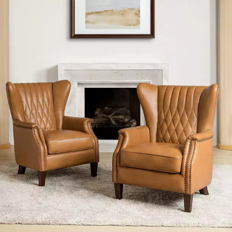 Set di 2 Poltrone Valerius in Vera Pelle con Bordi Borchiati e Gambe in Legno Massello | HULALA HOME
