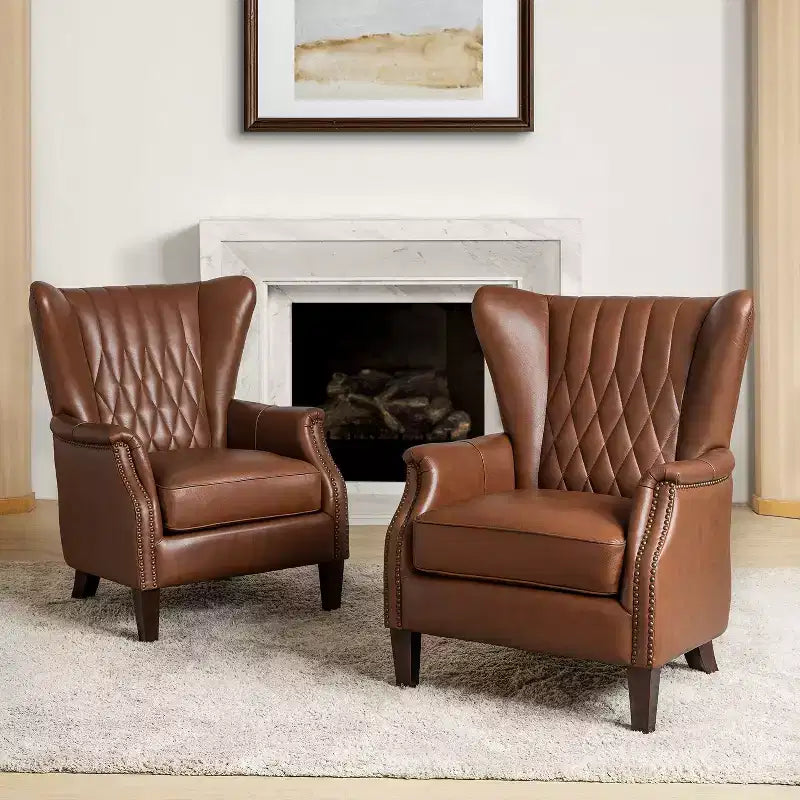 Set di 2 Poltrone Valerius in Vera Pelle con Bordi Borchiati e Gambe in Legno Massello | HULALA HOME