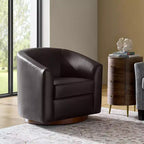 Poltrona a botte moderna girevole Jessie, 77,5 cm, in ecopelle con base in legno massello|ART OF LIVING DESIGNS