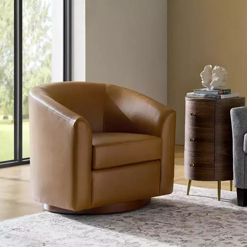 Poltrona a botte moderna girevole Jessie, 77,5 cm, in ecopelle con base in legno massello|ART OF LIVING DESIGNS