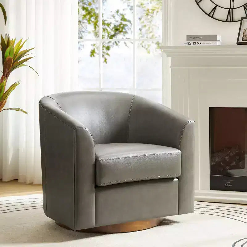 Poltrona a botte moderna girevole Jessie, 77,5 cm, in ecopelle con base in legno massello|ART OF LIVING DESIGNS