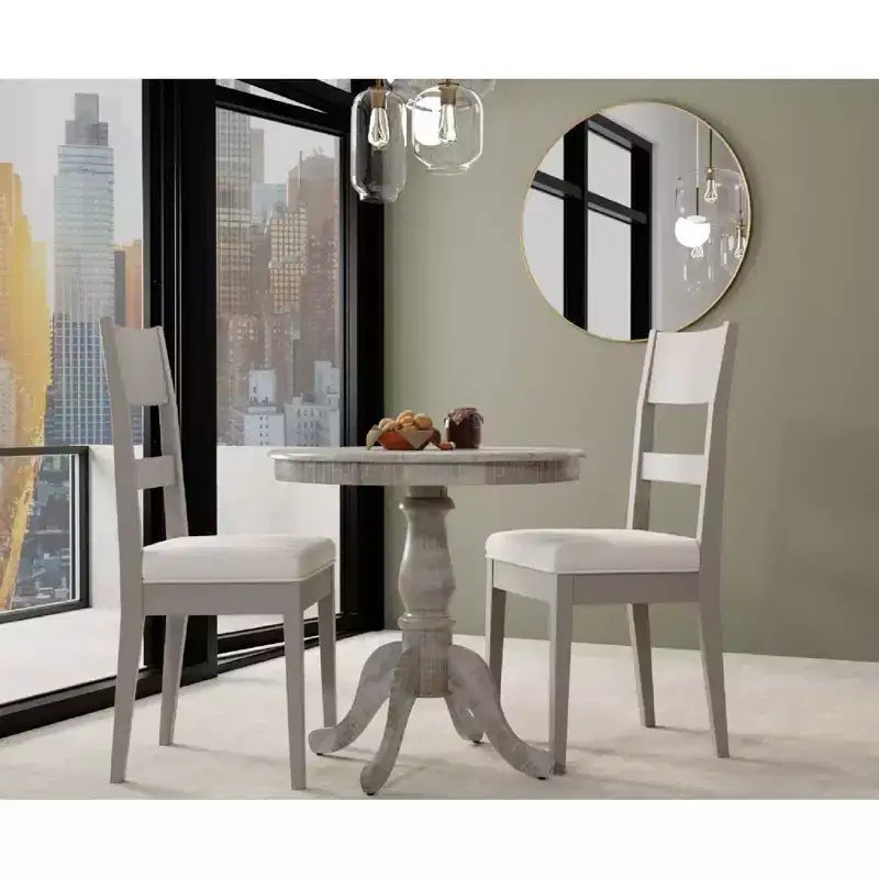 Tavolo da pranzo rotondo con piedistallo Carolina Living Salem