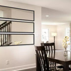 Specchio da parete con cornice Evans 16 x 48 - Kate and Laurel