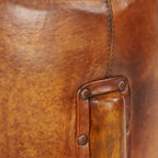 Pouf rotondo artigianale in vera pelle con dettagli capitonné e borchie e gambe in legno di teak – Marrone, singolo
