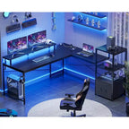 Scrivania angolare per computer con cassetto portadocumenti in tessuto, scaffali a 3 livelli, prese di corrente, luci LED e supporto per monitor – Bianco / Nero / Marrone, Singolo